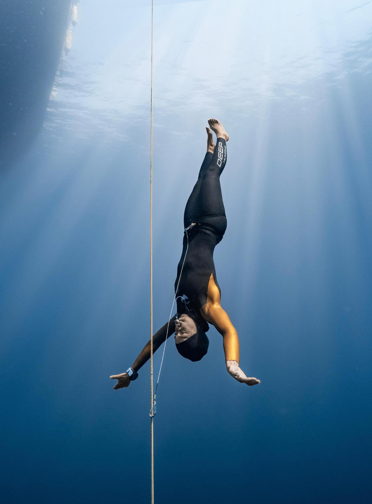 National athlete Sahika Ercumen dives headfirst during her free dive at the Free Diving Open Water Seniors and Masters Individual Türkiye Championship in Antalya, Türkiye, July 20, 2025. (AA Photo)