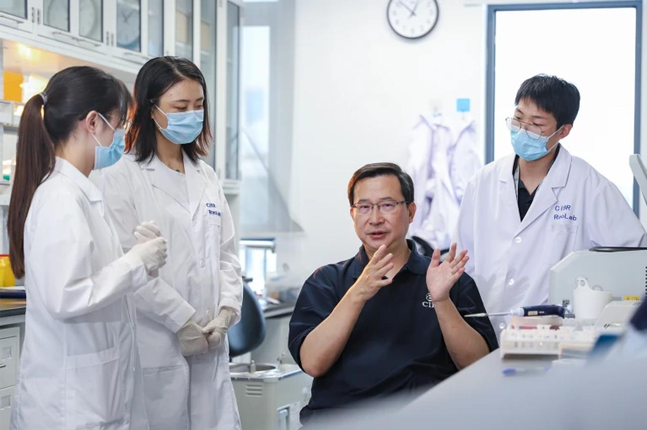 Yi Rao, co-director of The Chinese Institute for Brain Research (CIBR) during a discussion with research students, Beijing, China, accessed July 21, 2025. (Photo via CIBR)