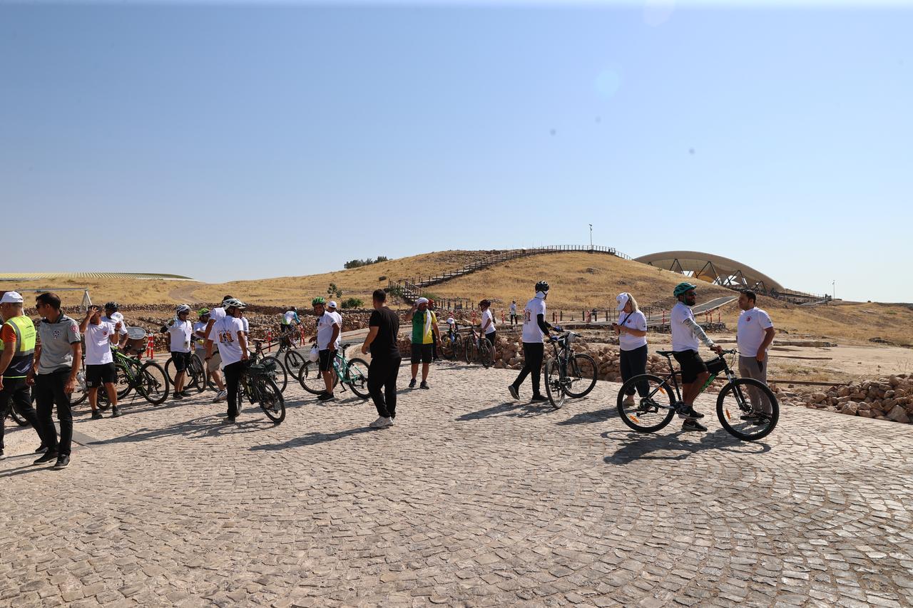 A cycling event was held in memory of Professor Klaus Schmidt, who uncovered UNESCO-listed Gobeklitepe, in Sanliurfa, Turkiye, July 20, 2025. (AA Photo)