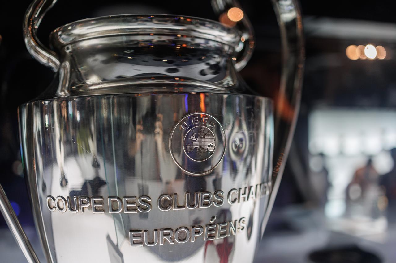 UEFA Champions League trophy on display at a football exhibition in Barcelona, Spain, August 2022. (Adobe Stock Photo)