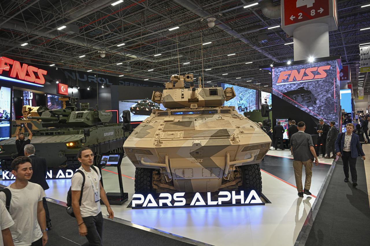 People visit the stands during IDEF 2025, where more than 400 international companies from 44 countries exhibit their products, at the Istanbul Expo Center in Istanbul, Türkiye on July 22, 2025. (AA Photo)