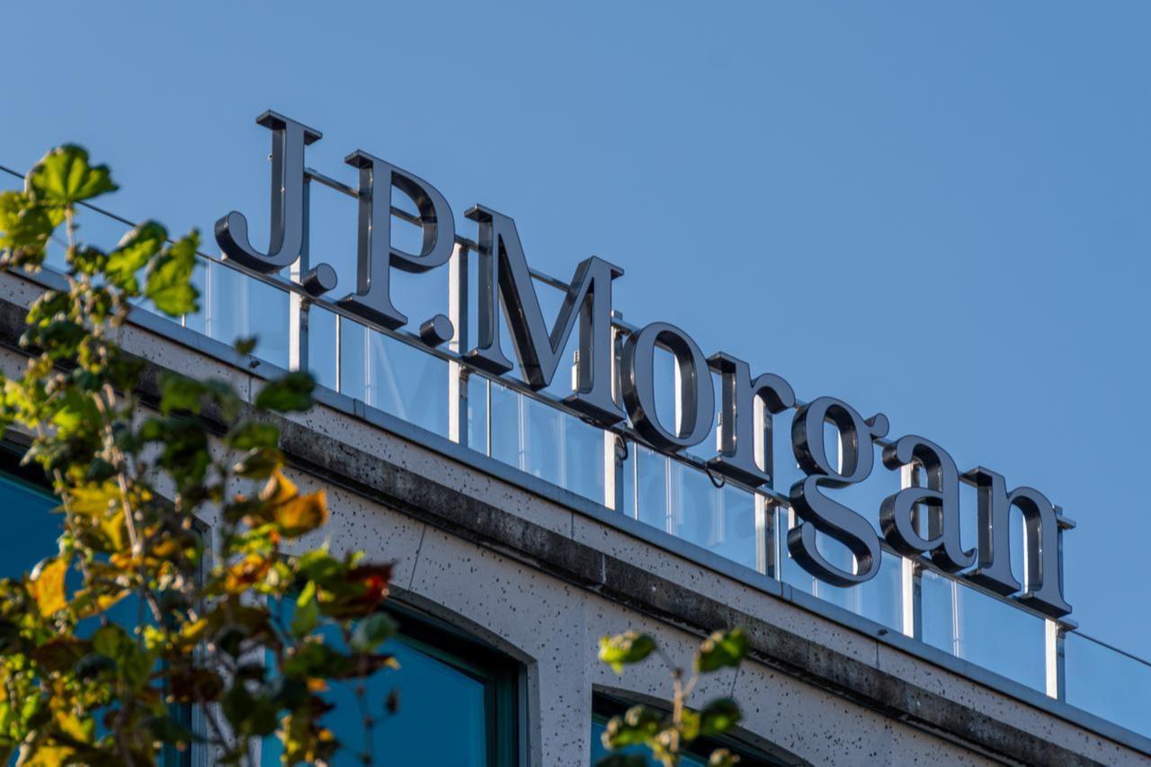JPMorgan logo stands against a clear blue sky