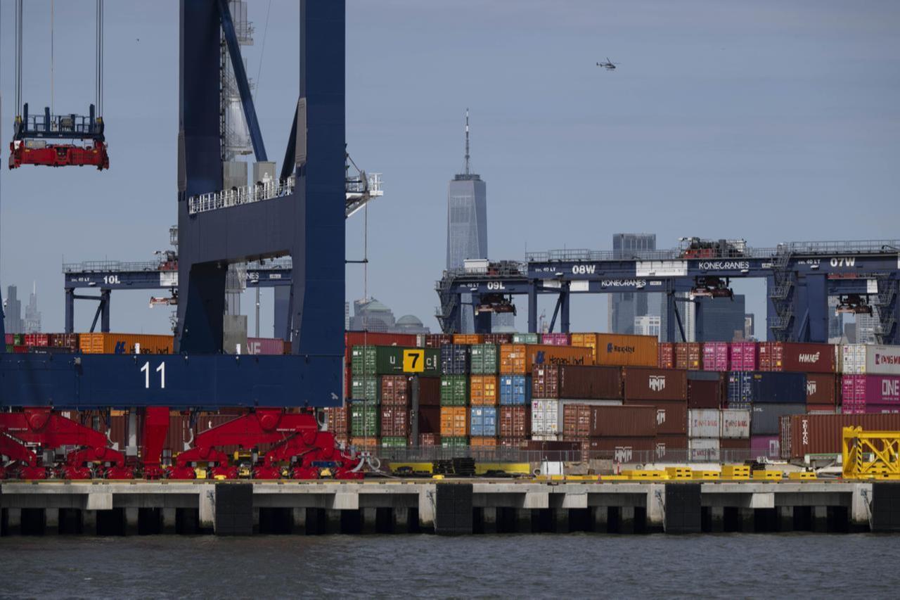 Containers are loaded and unloaded from cargo ships at Port Jersey Container Terminal in New Jersey, US, May 1, 2025. (AA Photo)