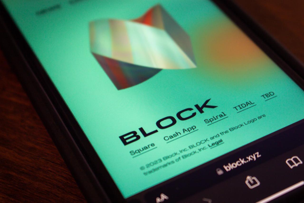 A smartphone displaying the website of Block. (Adobe Stock Photo)