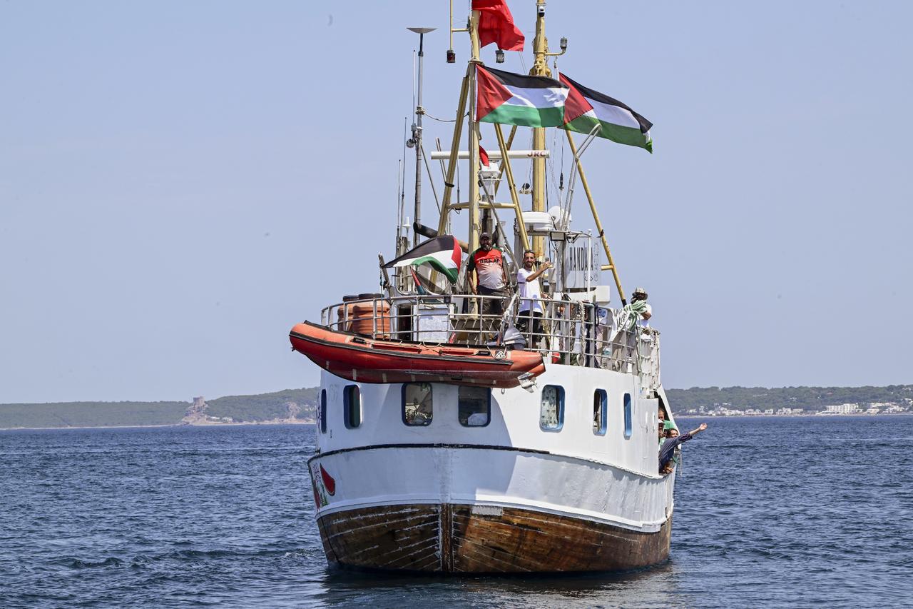 Crew of Handala vessel seen sailing in the port of Gallipoli after a press point, the vessel  Handala  of Freedom Flotilla Coalition departed from Gallipoli Port, in Italy on 20 July 2025. (AA Photo)