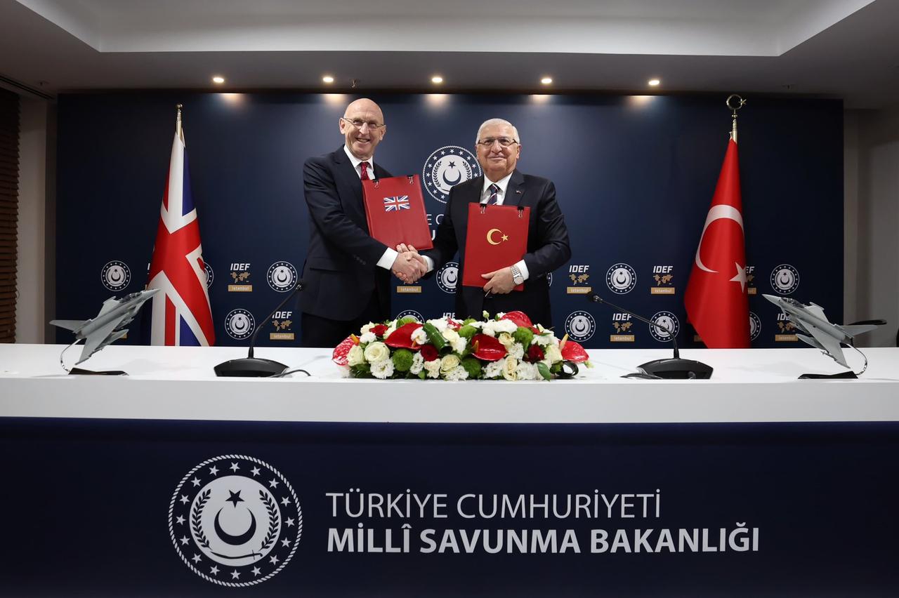 Defense Minister Yasar Guler (R) and British Defense Secretary John Healey (L) sign a comprehensive memorandum of understanding regarding Türkiyes acceptance as a Eurofighter Typhoon user in Istanbul, Türkiye on July 23, 2025. (AA Photo)