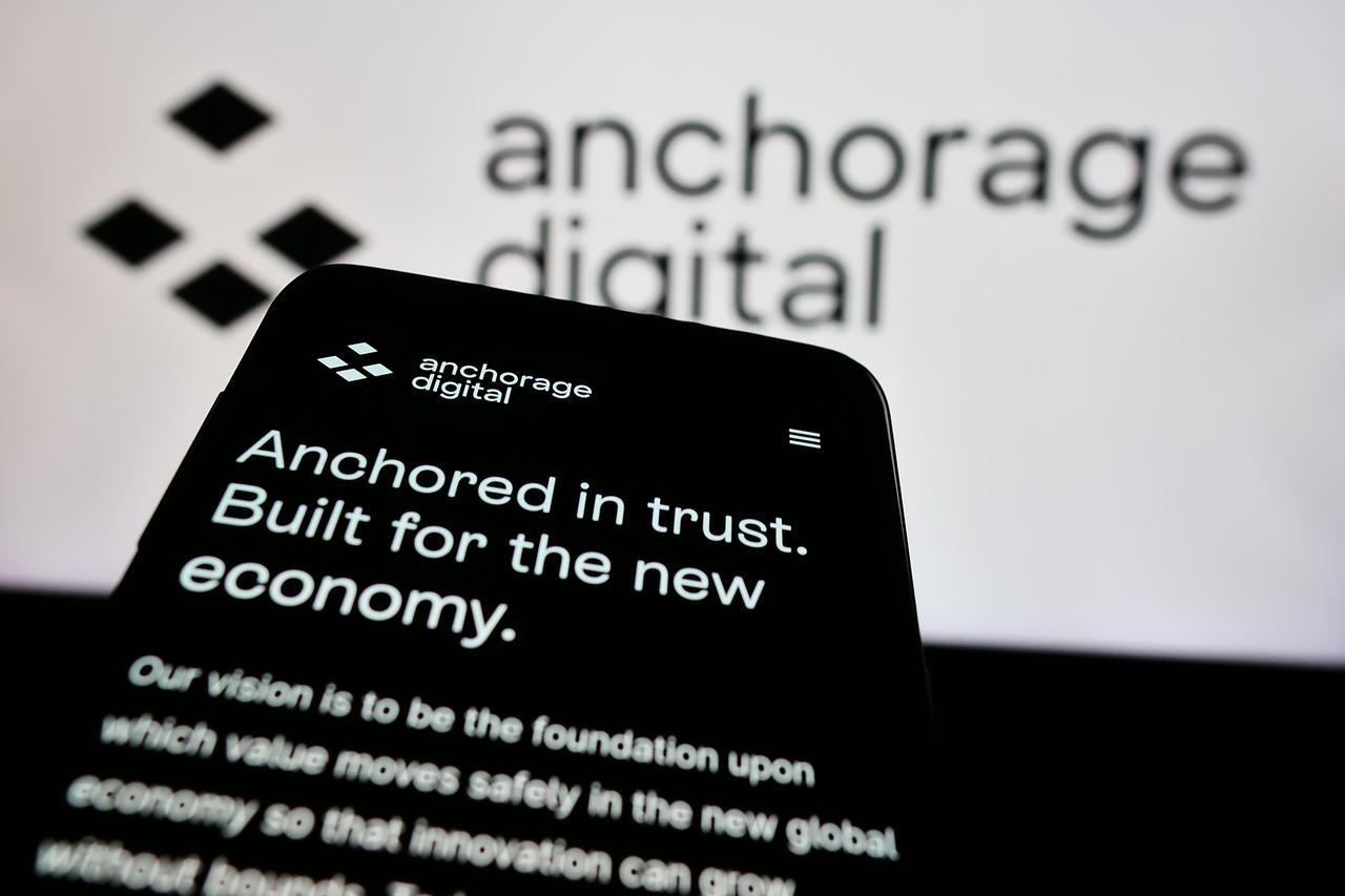 Anchorage Digital website shown in a photo illustration (Adobe Stock Photo)