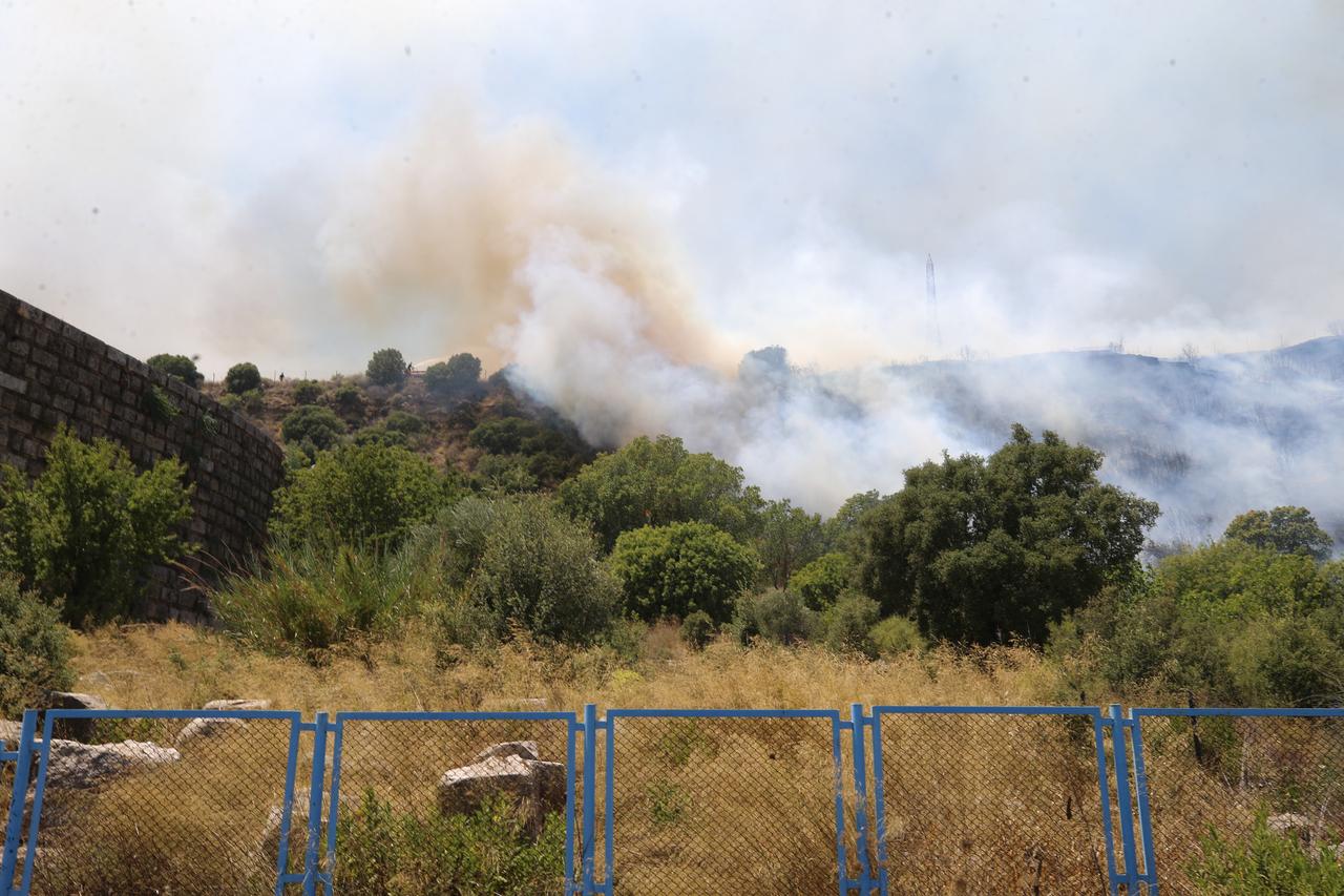 Flames surround the theater structure of the ancient city of Perge in Antalya’s Aksu district after a forest fire broke out, Türkiye, July 25, 2025. (AA Photo)