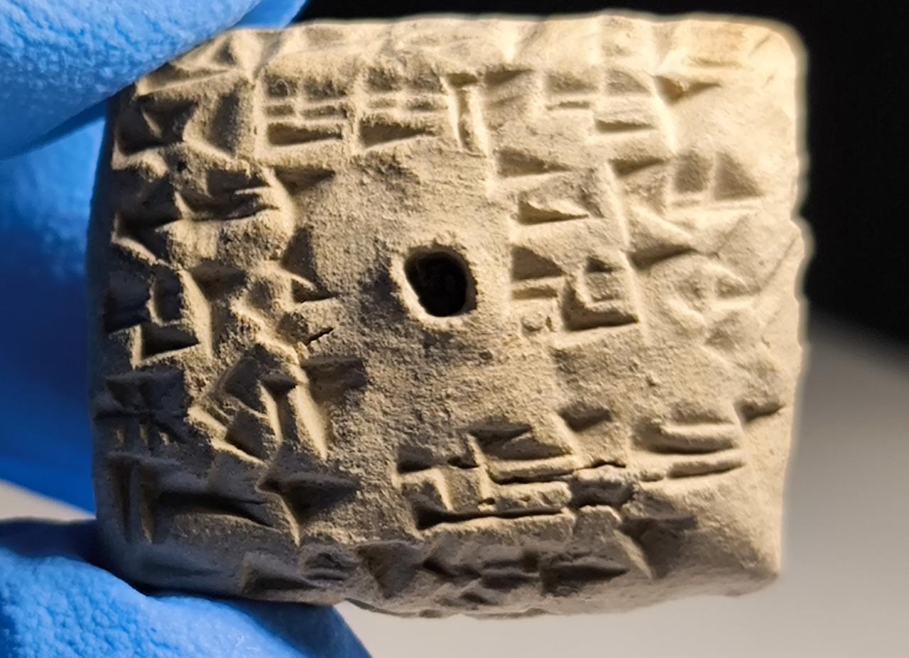 A "bird oracle text" containing information on the flight patterns of birds discovered during excavations at Kayalipinar, in Sivas, Türkiye, July 24, 2025. (AA Photo)