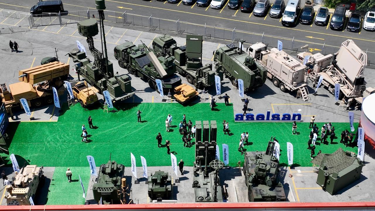An aerial view shows Military vehicles and advanced defense systems developed by Turkish defense companies are displayed at the outdoor exhibition area of IDEF 2025 in Istanbul, Türkiye on July 24, 2025. (AA Photo)