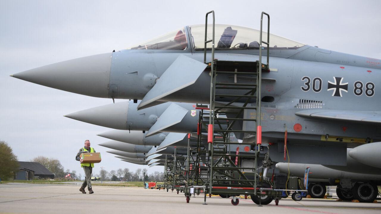 Luftwaffe (German Air Force) Eurofighters EF-2000 Typhoon aircraft line the tarmac during a NATO air force exercise at Leeuwarden Air Base, on April 9, 2025. (AFP Photo)