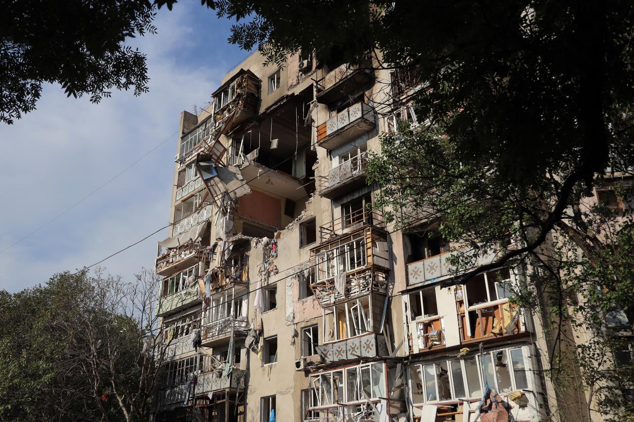 This photograph taken on July 24, 2025 shows a damaged residential building following a drone attack in Odesa. (AFP Photo)