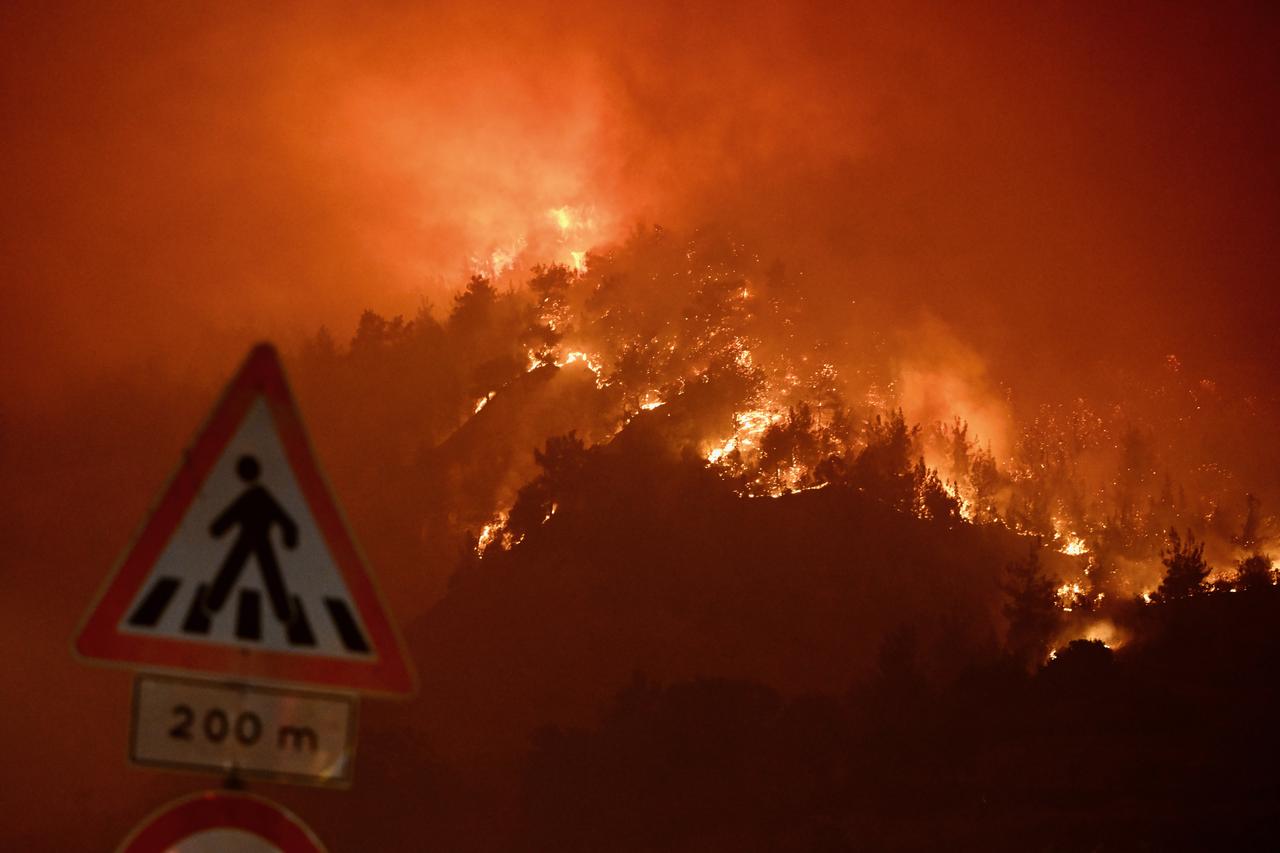 Smoke rises from the burnt area as firefighting efforts continue on the fourth day of forest fires in Turkish city of Karabuk, Türkiye, July 26, 2025. (AA Photo)