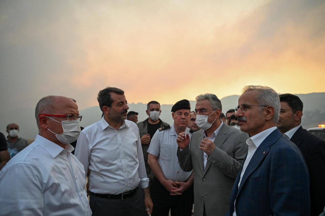 Minister of Transport and Infrastructure Abdulkadir Uraloglu visits the fire zone with Bursa Governor Erol Ayyildiz and AK Party Provincial Chairman Davut Gurkan, inspects the area, and receives information from officials, Bursa, Türkiye, July 26, 2025. (AA Photo)