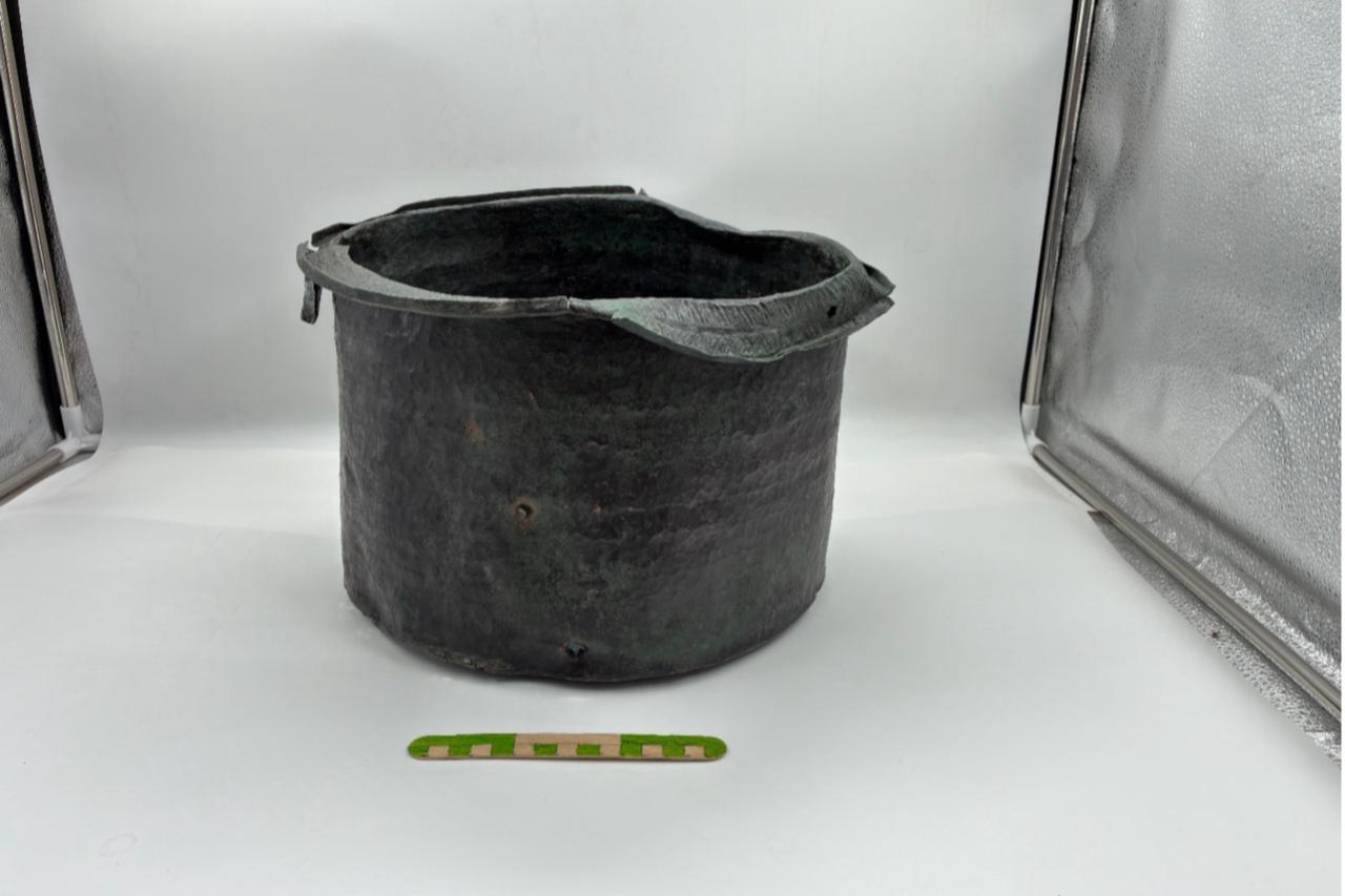A 1,400-year-old bronze cauldron, believed to date back to the Roman period, was discovered during excavations at the ancient city of Pergamon in the Bergama district of Izmir, Türkiye, July 27, 2025. (AA Photo)