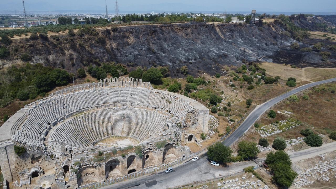 Aerial view of the burned areas—mostly red pine forest—near Perge Ancient City in Türkiye’s Antalya province, where a wildfire broke out two days ago in the Kursunlu neighborhood of Aksu district, July 27, 2025. (AA Photo)