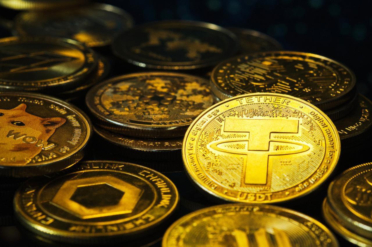 Close-up of gleaming cryptocurrency coins, featuring Tether at the forefront.(Adobe Stock Photo)