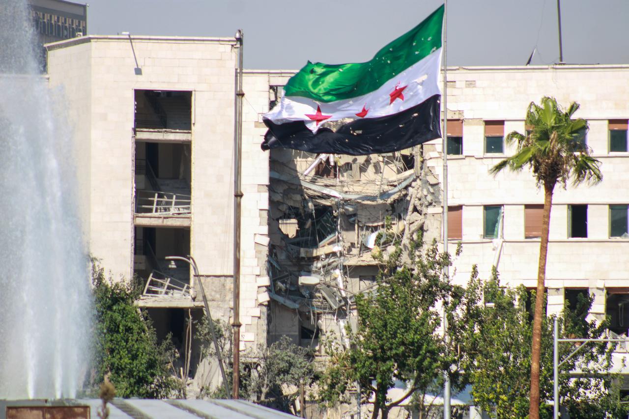 Emergency services and security forces arrive and set up a security perimeter following an Israeli airstrike targeting the entrance of the Syrian army’s General Staff Complex in Damascus, Syria, on July 16, 2025. (AA Photo)
