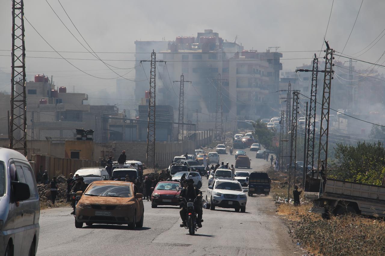 Smoke rises as clashes continue between Bedouin Arabs and some Druze armed groups in Syria’s southern Sweida province on July 19, 2025. (AA Photo)