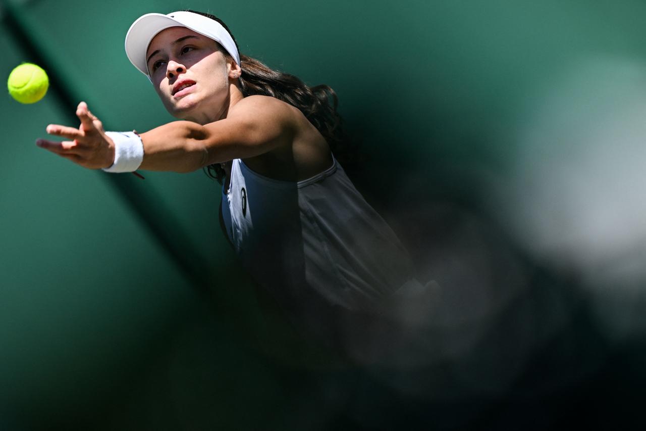 Zeynep Sonmez serves to Chinas Wang Xinyu during their womens singles second round tennis match on the fourth day of the 2025 Wimbledon Championships at The All England Lawn Tennis and Croquet Club in Wimbledon, southwest London, July 3, 2025. (AFP Photo)
