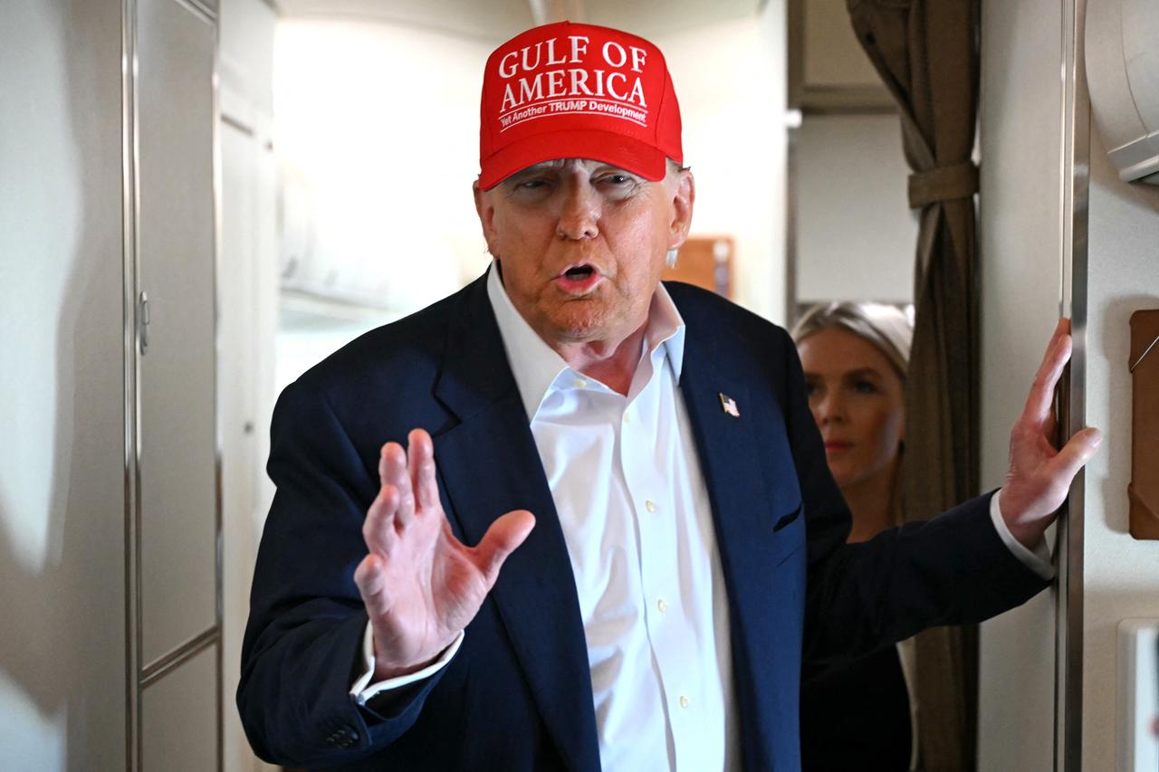 US President Donald Trump speaks with the press on board Air Force One as he travels from Ochopee, Florida to Joint Base Andrews, Maryland on July 1, 2025. (AFP Photo)