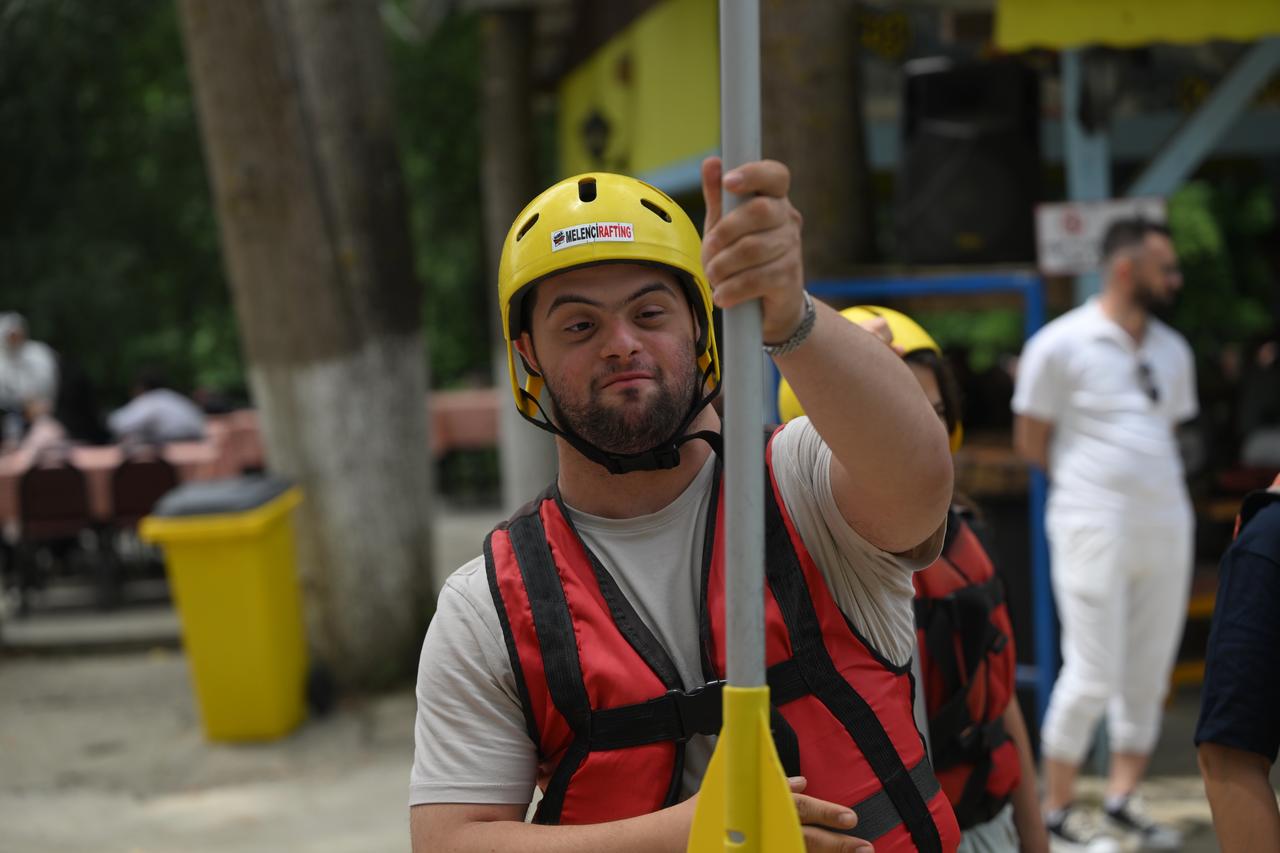 People with special needs take part in rafting tours as part of “Happiness Boat" project organized on certain days of the year by rafting companies in Duzce, Türkiye, July 1, 2025. (AA Photo)