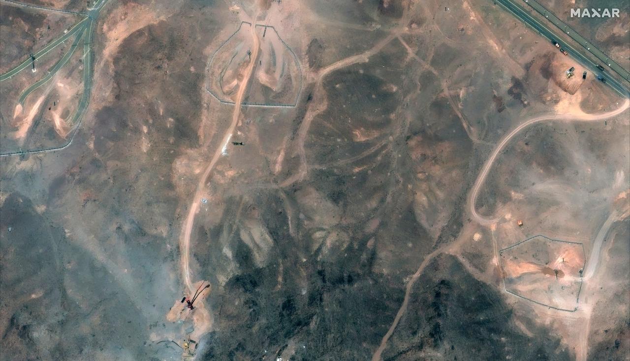 Satellite image shows a wider view underground entrances and activity at the Fordo (Fordow) Fuel Enrichment Plant complex in central Iran, accessed on July 3, 2025. (AFP Photo)