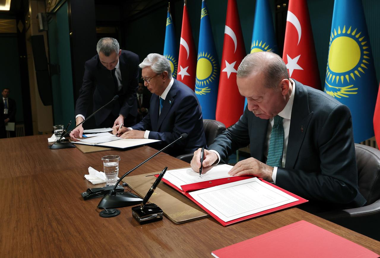 Turkish President Recep Tayyip Erdogan (R) and his Kazakh counterpart Kassym-Jomart Tokayev (L) sign the joint declaration of the fifth meeting of the Türkiye-Kazakhstan High-Level Strategic Council during the signing ceremony in Ankara, Türkiye on July 29, 2025. (Turkish Presidency / AA Photo)
