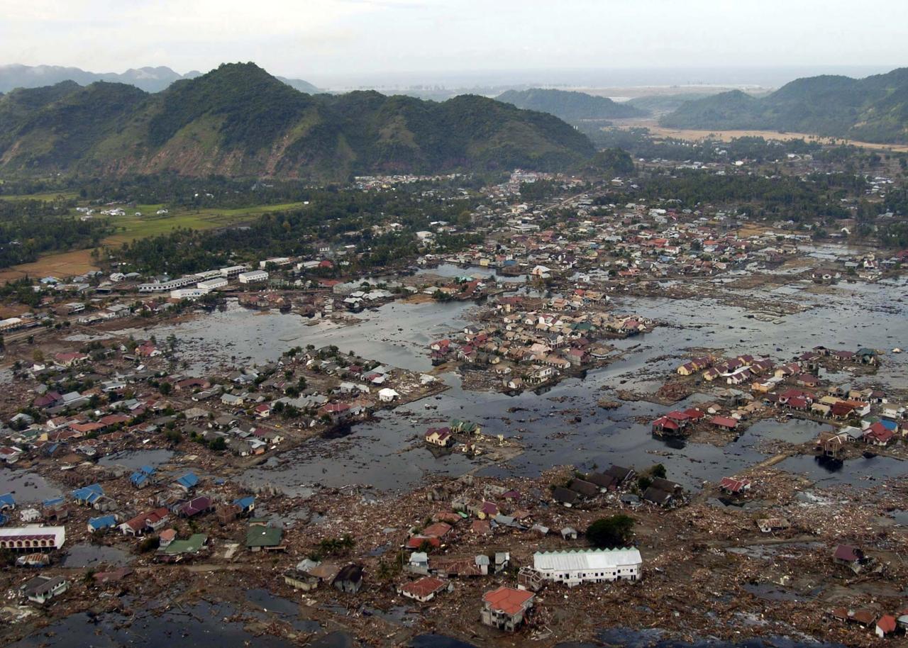 A village near the coast of Sumatra lies in ruins after the Tsunami that struck South East Asia, Jan. 2, 2005. (Photo via Wikimedia)