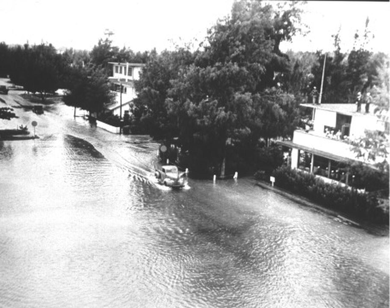Flooded street resulting from the arrival of the Kamchatka tsunami on Midway Island about 3,000 km away from the origin, 1952. (Photo via U.S. Navy)
