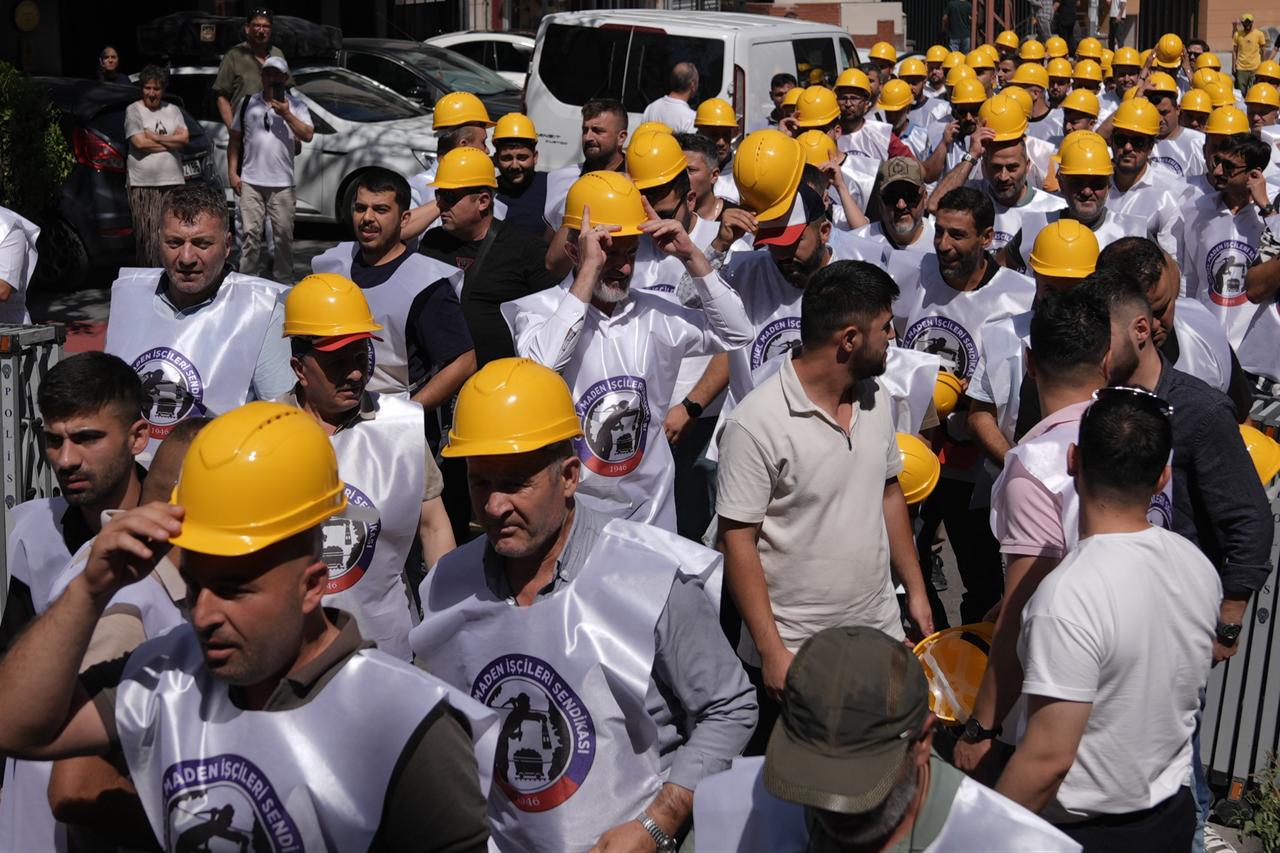 Mine workers gather outside the Turk-Is headquarters to attend union president Ergun Atalays press conference in Ankara, Türkiye, on July 30, 2025. (AA Photo)