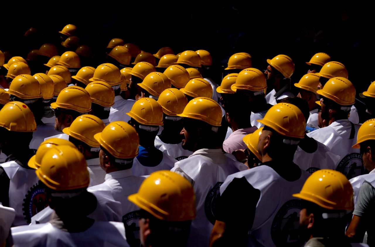 Mine workers gather outside the Turk-Is headquarters to attend union president Ergun Atalay's press conference in Ankara, Türkiye, on July 30, 2025. (AA Photo)