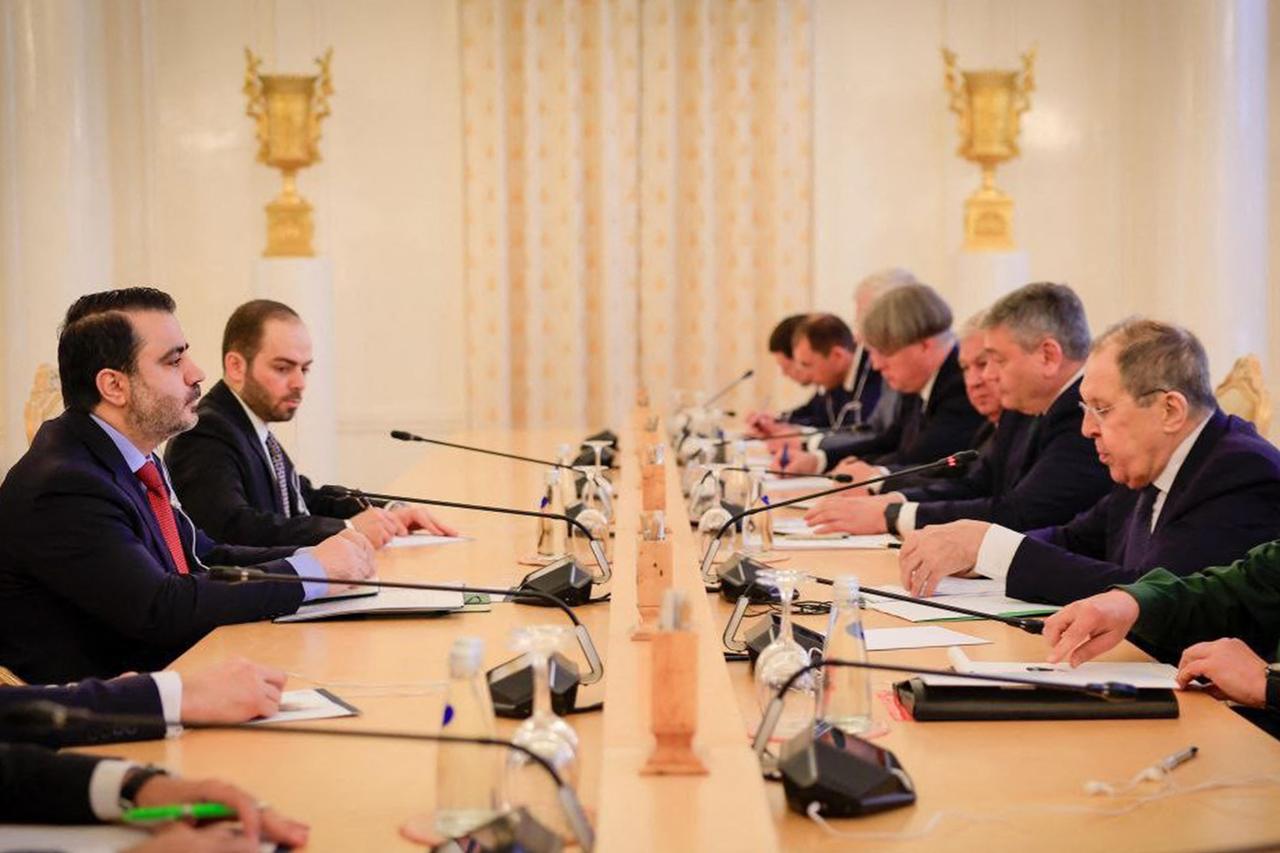 Syria's interim Foreign Minister Asaad al-Shaibani (L) and a delegation meeting with his Russian counterpart Sergei Lavrov (R) in Moscow on July 31, 2025. (Photo by SANA / AFP)