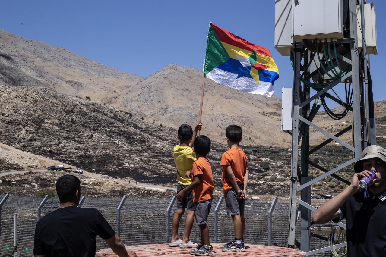Israeli forces allows Druze visiting relatives in Israel to return to their villages in Syria, at Majdal Shams on July 17, 2025. (AA Photo)