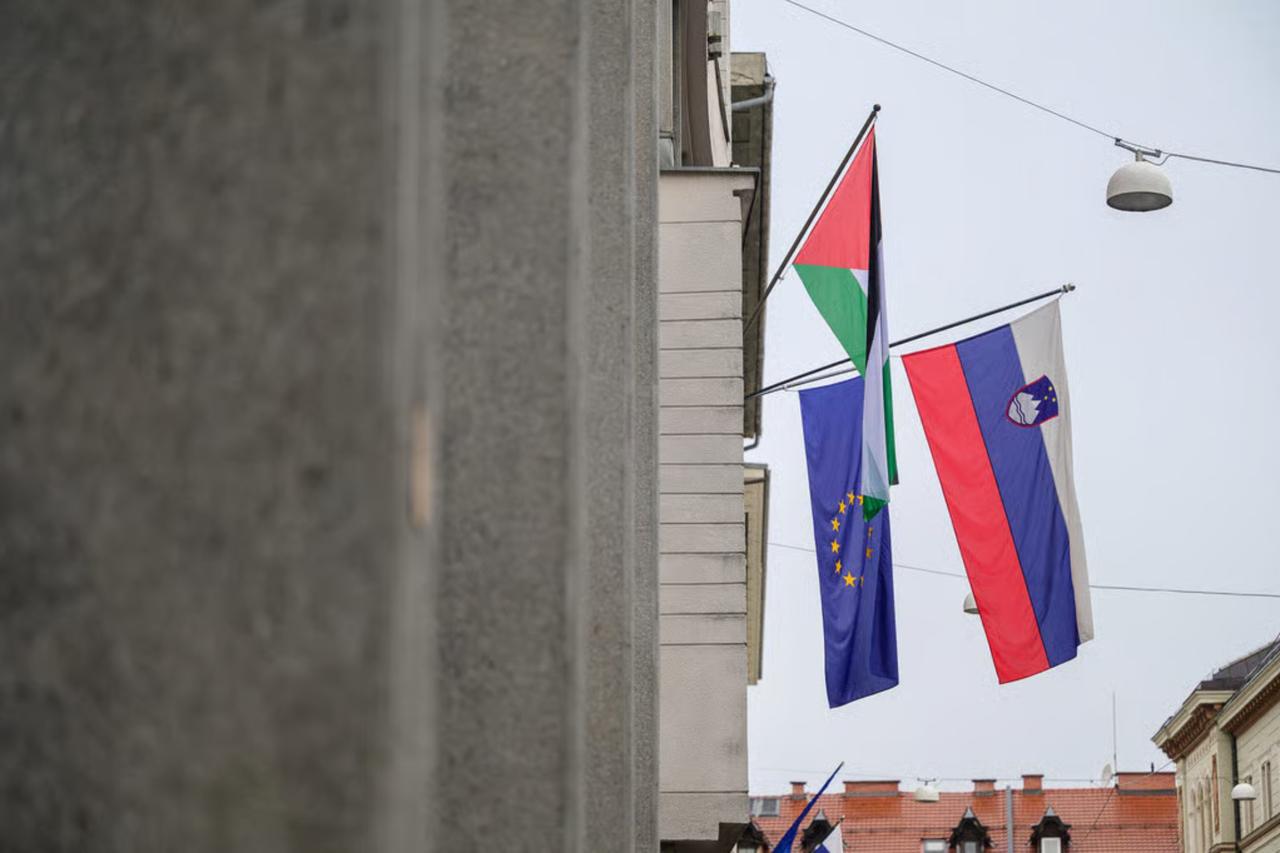 Photo shows Palestinian flag along with Slovenian and EU flags, accessed on July 31, 2025. (Photo via Politico)