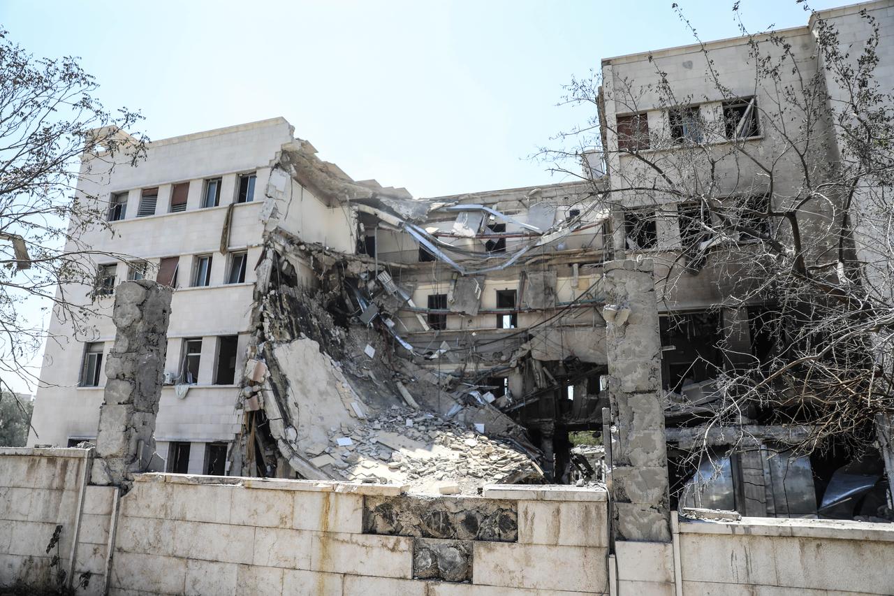 A view of damage at the Syrian General Staff headquarters and nearby buildings following Israeli airstrikes targeting the capital Damascus, Syria on July 17, 2025. (AA Photo)