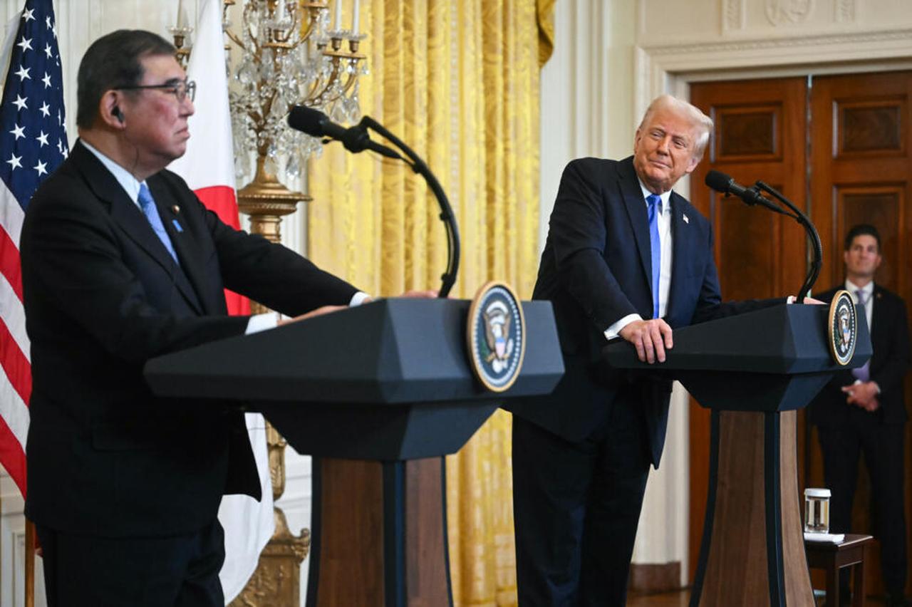 US President Donald Trump (R) looks on as Japanese Prime Minister Shigeru Ishiba speaks during a joint press conference in the East Room of the White House in Washington, DC, on February 7, 2025. (AFP Photo)