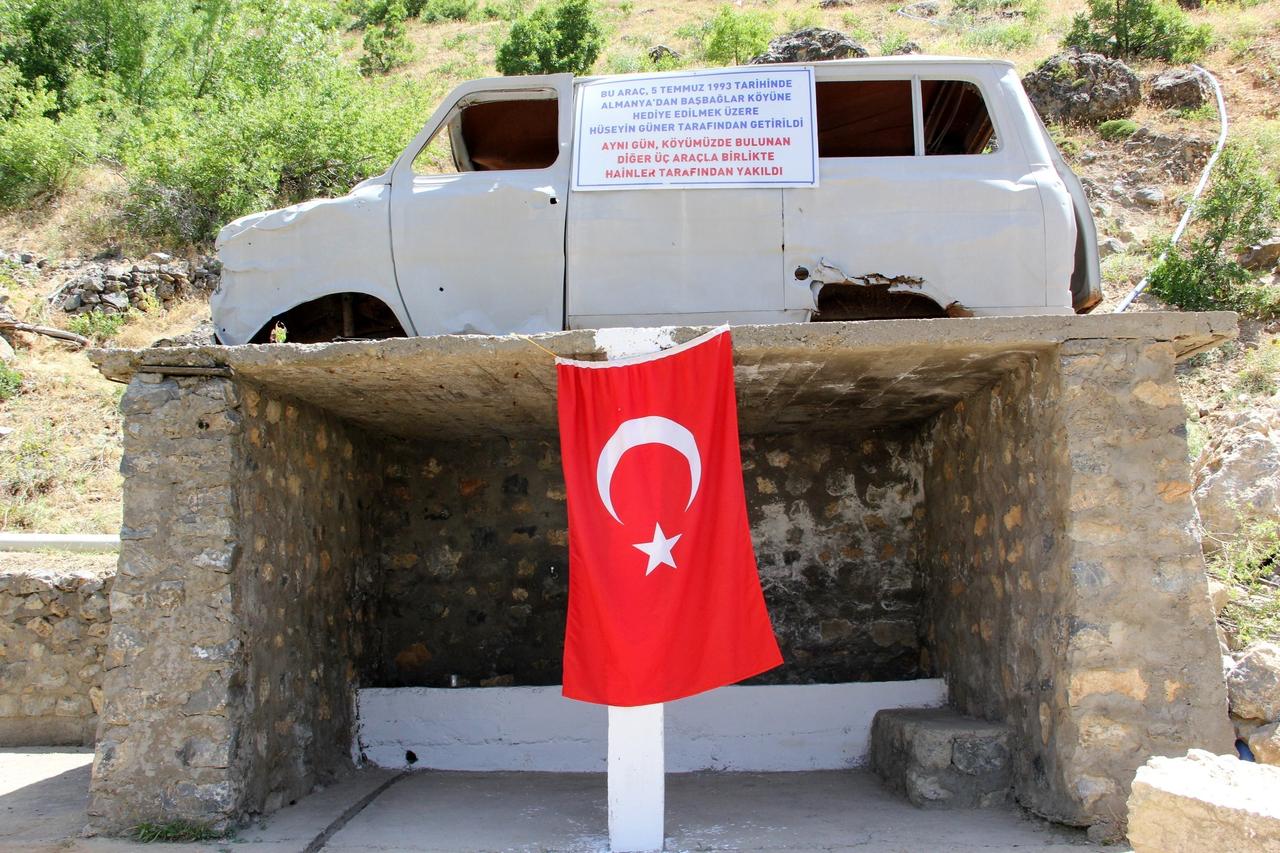 A car from the night, where 33 civilians who were shot and burned to death by PKK terrorists 32 years ago in Basbaglar village of Kemaliye district of Erzincan province, accessed on July 5, 2025. (IHA Photo)