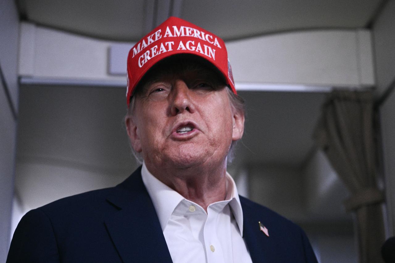 US President Donald Trump speaks to journalists aboard Air Force One after departing Joint Base Andrews, Maryland on his way to Bedminster, New Jersey on July 4, 2025. (AFP Photo)