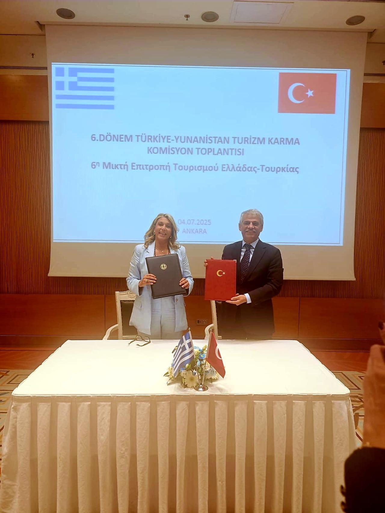Türkiye’s Deputy Minister of Culture and Tourism Nadir Alpaslan (right) and Greece’s Deputy Minister of Tourism Anna Karamanli (left) pose after signing a protocol to enhance tourism cooperation between the two countries during the 6th Joint Tourism Committee Meeting held in Ankara, Türkiye, on July 4, 2025. (AA Photo)