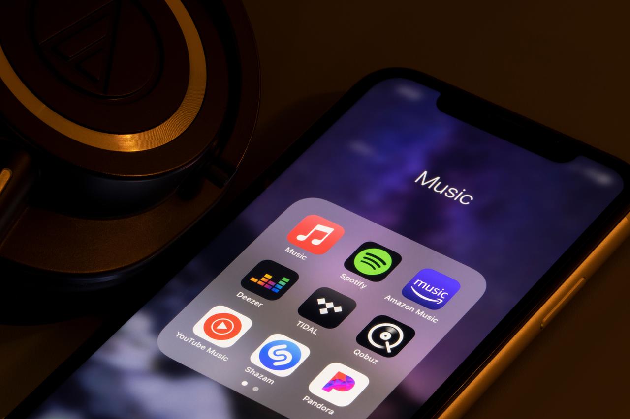 Assorted music streaming apps, including Apple Music, Spotify, Amazon Music, Deezer, TIDAL, Qobuz, YouTube Music, Shazam, and Pandora, displayed on a smartphone in Portland, Oregon, on March 16, 2021. (Adobe Stock Photo)
