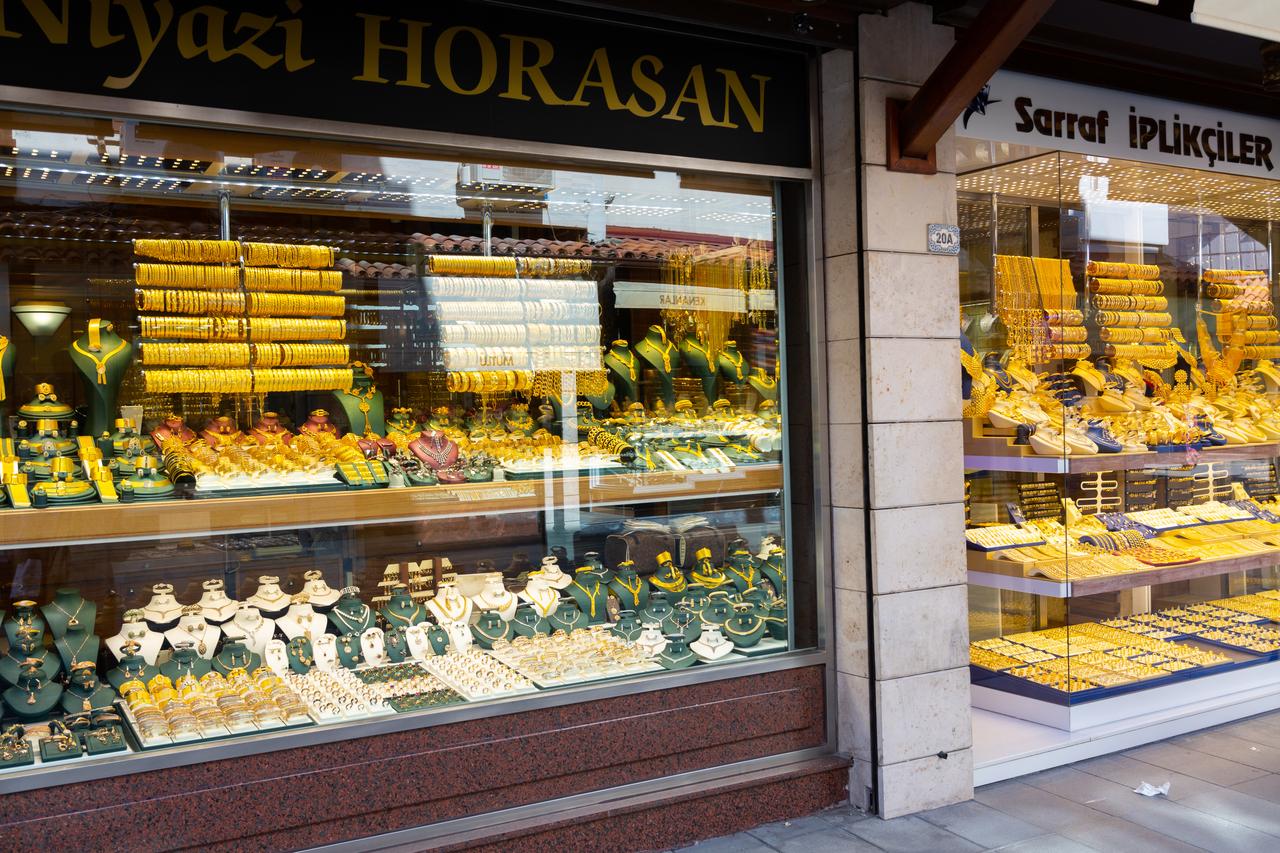 Gold items in shop windows at the "golden street" of Konya, Türkiye on May 9, 2022. (Adobe Stock Photo)