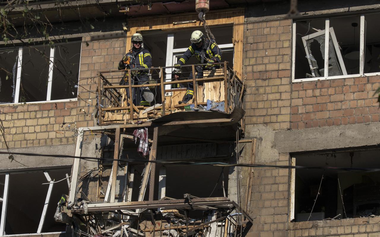 Ukrainian rescuers work in a damaged residential building following mass Russian drone and missile strikes on Ukraine's capital Kyiv on July 4, 2025. (AFP Photo)