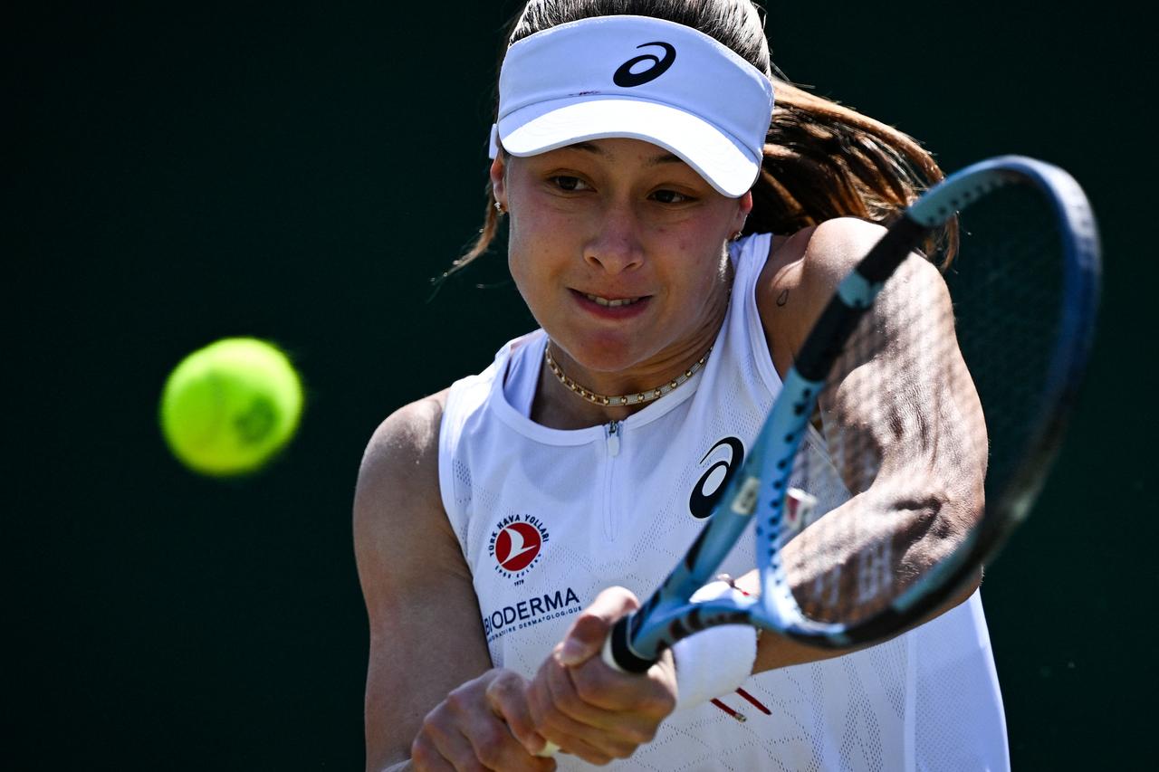 Zeynep Sonmez hits a backhand return against China’s Wang Xinyu during their women’s singles second-round match on the fourth day of the 2025 Wimbledon Championships at The All England Lawn Tennis and Croquet Club in Wimbledon, southwest London, on July 3, 2025. (AFP Photo)