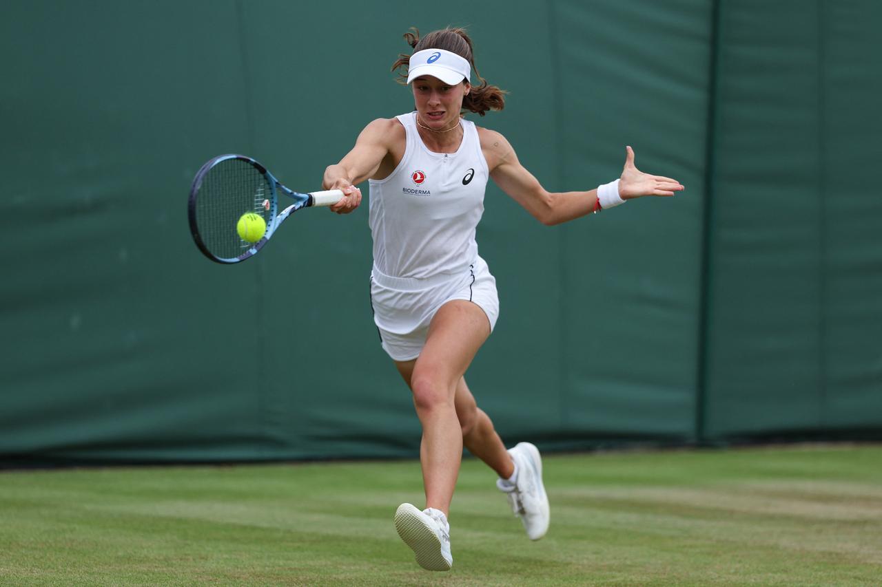 Zeynep Sonmez is making a forehand return against Russia’s Ekaterina Alexandrova during their women’s singles third-round match on the sixth day of the 2025 Wimbledon Championships at The All England Lawn Tennis and Croquet Club in Wimbledon, southwest London, on July 5, 2025. (AFP Photo)