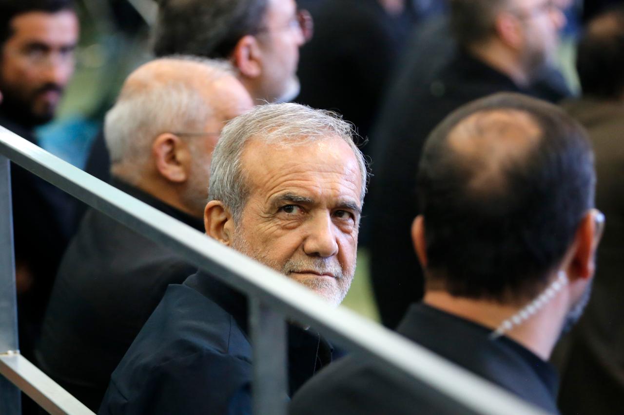 Iranian President Masoud Pezeshkian (2nd R), Parliament Speaker Mohammad Bagher Ghalibaf, and Judiciary Chief Gholam Hossein Mohseni-Ejei attend a memorial ceremony for scientists, civilians, and senior officials killed in Israeli attacks at the Grand Musalla Mosque, in Tehran, Iran on July 2, 2025. (AA Photo)