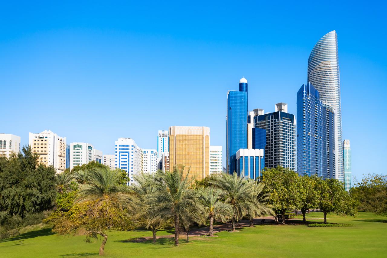 Corniche Park and Abu Dhabi city skyline in United Arab Emirates. (Adobe Stock Photo)