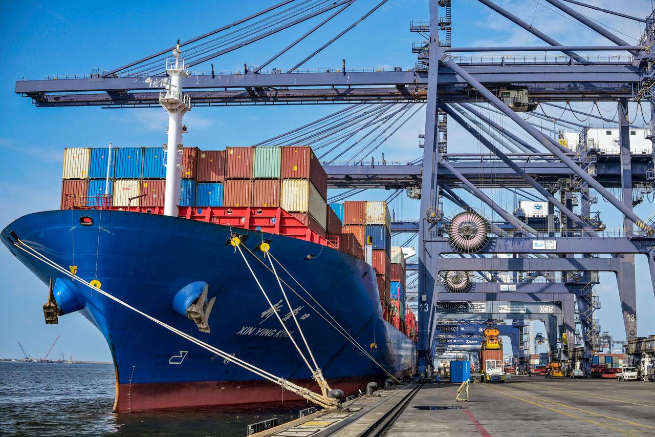 Containers are stacked on a cargo ship at the Jakarta International Container Terminal in Tanjung Priok Port, Jakarta on July 7, 2025. (AFP Photo)