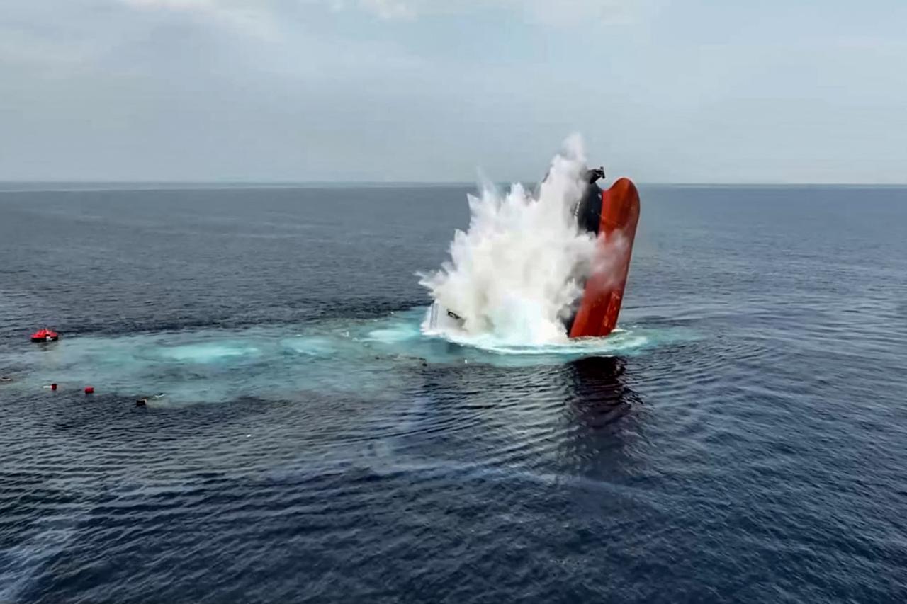 This handout image released by Yemen’s Huthi Ansarullah Media Centre shows the Liberian-flagged bulk carrier Eternity C sinking after it was attacked by the Huthi group in the Red Sea on July 8, 2025. (AFP Photo)
