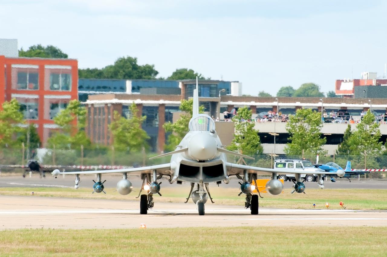 An Eurofighter Typhoon fighter jet taxiing before take-off at Farnborough, UK on July 24, 2010. (Adobe Stock Photo)
